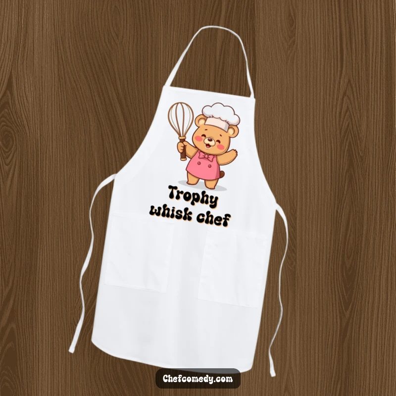 Funny Kawaii Bear Chef Apron, a happy cartoon bear holding a whisk trophy, protective and humorous kitchen wear.