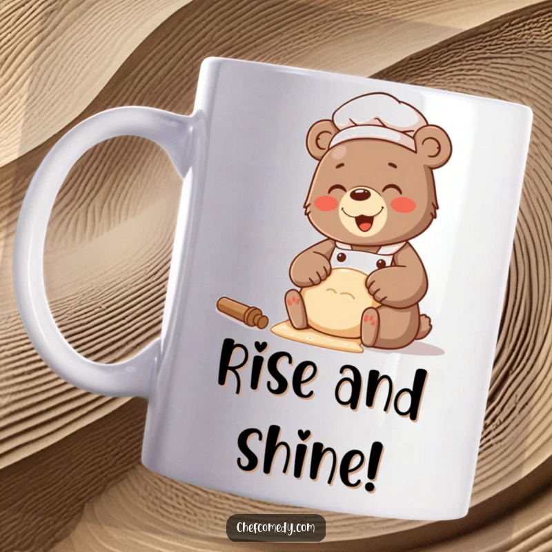 Funny mug featuring a bear chef with a happy, giggling expression while kneading a ball of dough.
