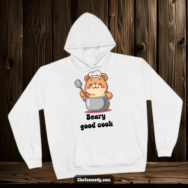 Funny Bear Chef Hoodie: An enthusiastic bear stirs a bubbling pot, exuding warmth and culinary cheer.
