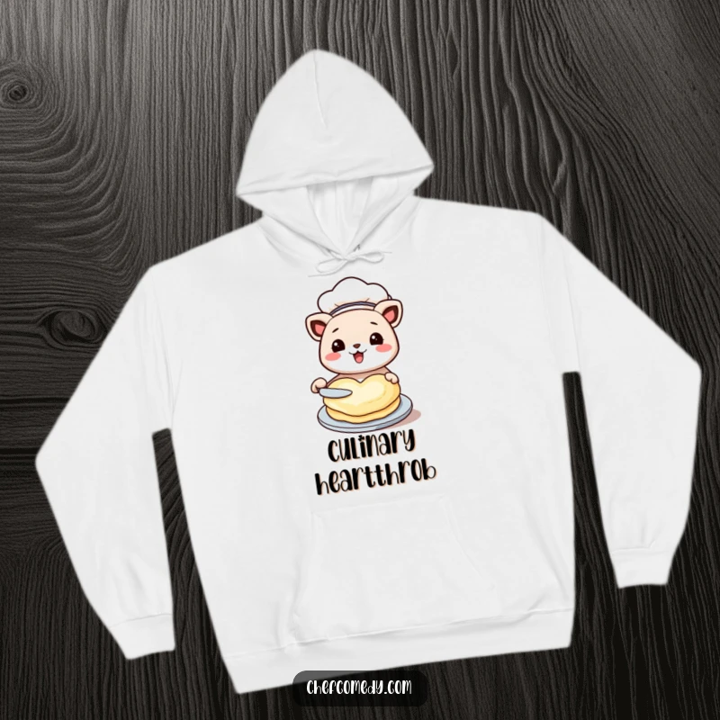 Funny kawaii animal hoodie, depicted as a chef, happily flipping a heart-shaped pancake, symbolizing love and deliciousness.