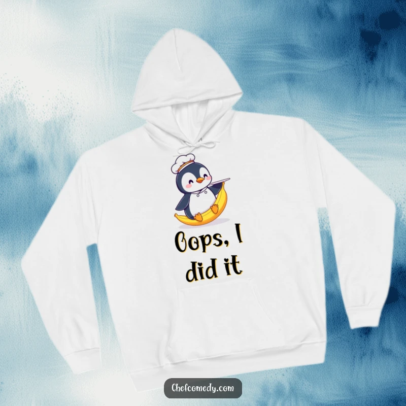 Funny Penguin Chef Hoodie: A penguin chef humorously slipping on a banana peel while carrying a plate, a cozy and comical garment.
