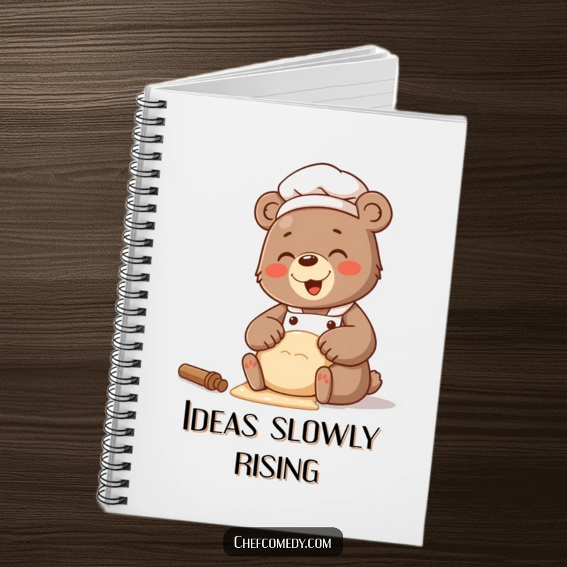 Funny notebook featuring a bear chef with a happy giggle while kneading dough, perfect for recipes.