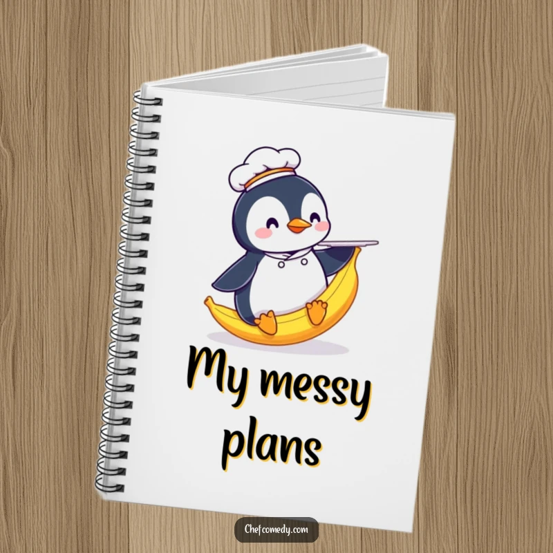 Funny Penguin Chef Notebook: Features a penguin chef slipping on a banana peel with a plate, inspiring humorous note-taking.