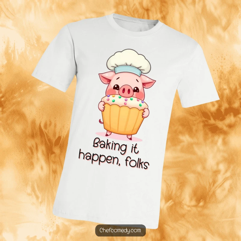 Funny Pig Chef T-Shirt: A cheerful pig chef stands proudly, presenting an enormous, decorated cupcake with a big smile.