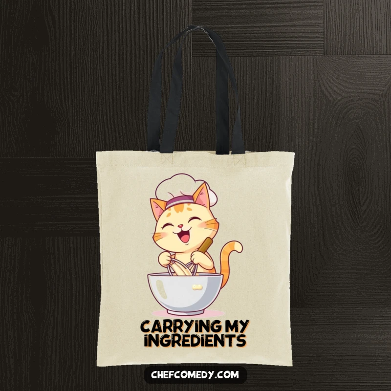 Funny tote bag with a happy cat chef energetically whisking batter in a large bowl, ideal for carrying groceries or baking supplies.
