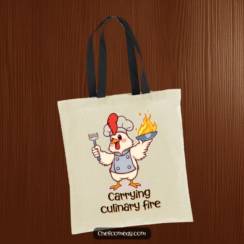 Funny tote bag featuring a confident chicken chef performing a daring toss of a flaming frying pan, excellent for market trips.