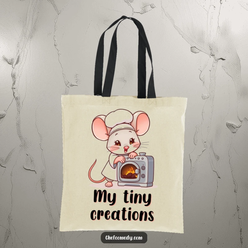 Funny mouse chef character fanning a tiny oven with great effort on a durable tote bag, perfect for shopping.